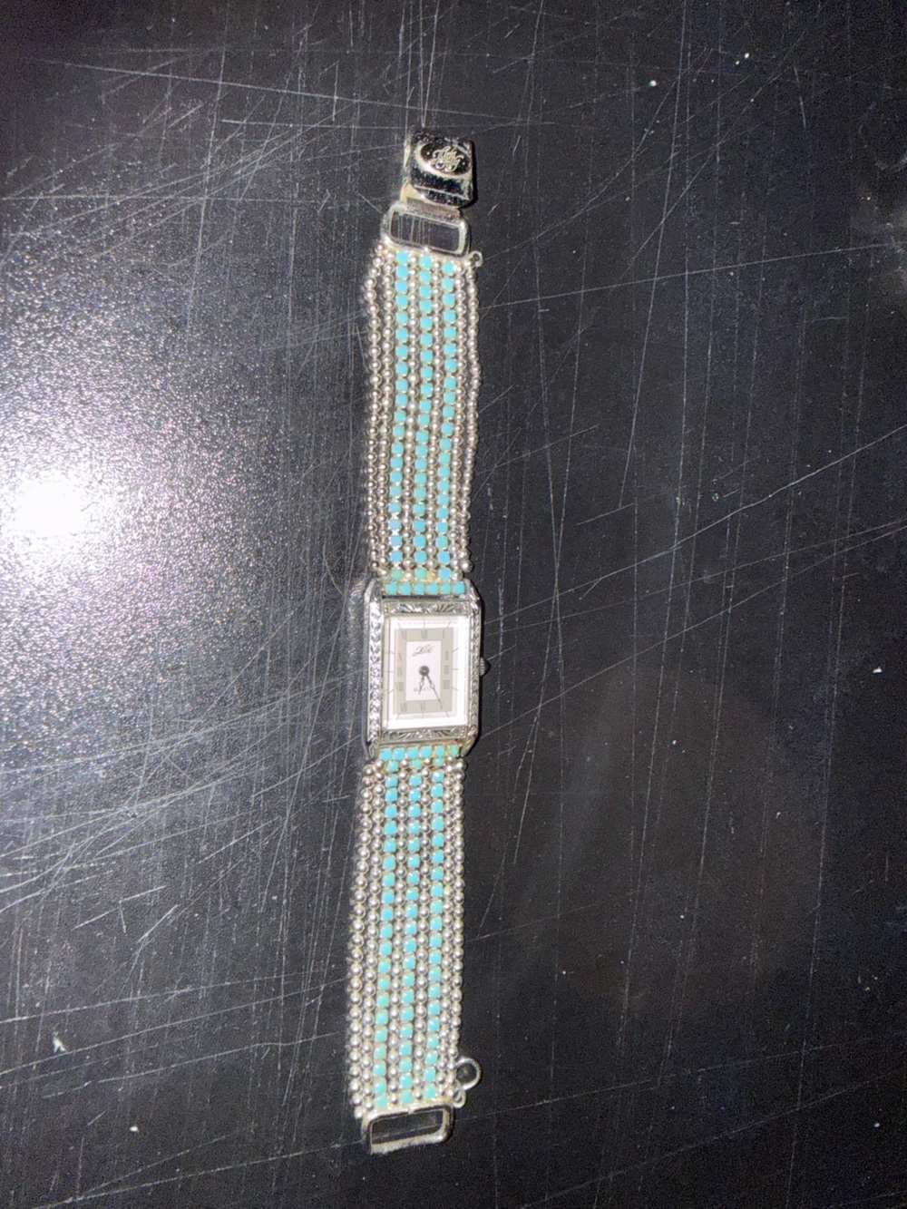 Vintage Kirks Folly Silver Watch with Turquoise Beaded Strap